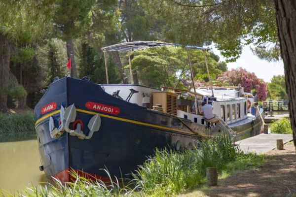 barge Anjodi moored on the canal du midi