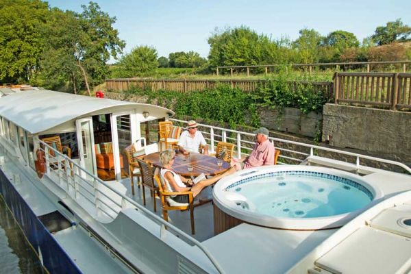 Luxury hotel barge Enchante, relaxing on deck