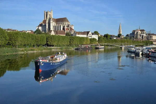 ADV cruising with cathedral in background