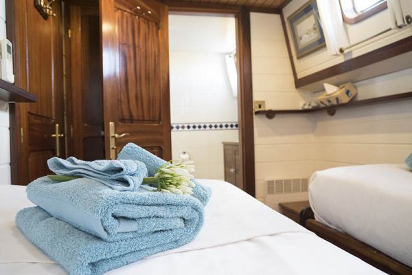 En-suite bathrooms aboard luxury hotel barge, Athos