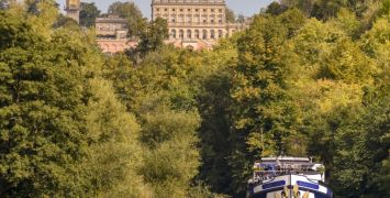 Magna Carta cruising Thames with Windsor Castle visible behind