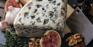 Roquefort cheese board with walnuts and figs