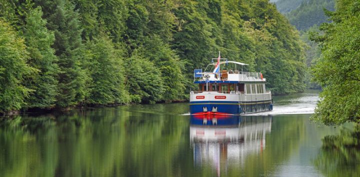 The Spirit of Scotland luxury hotel barge cruising the Caledonian Canal