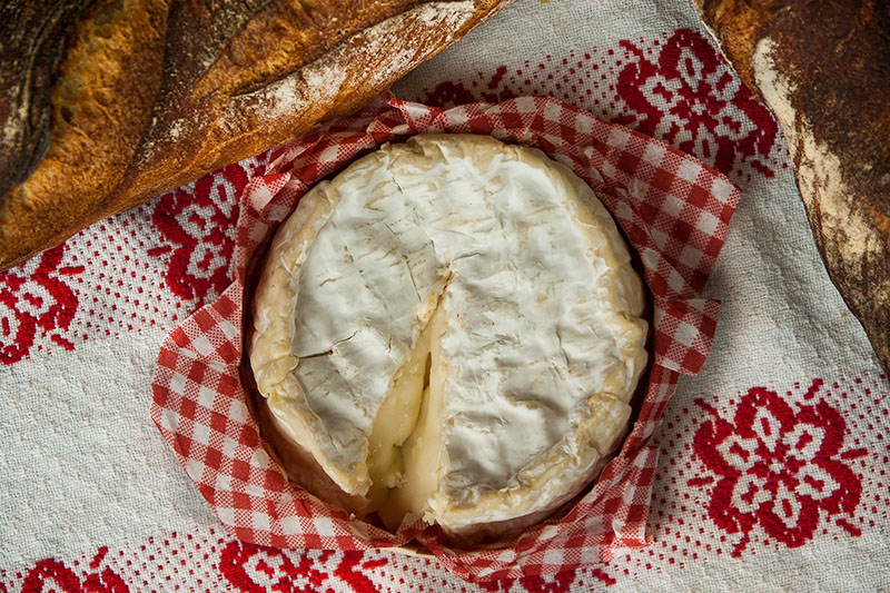 Baked Camembert served with Port and redcurrant sauce served with crusty bread