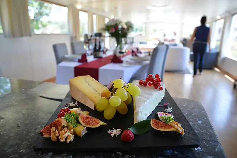 A typical cheese board served aboard hotel barge cruises
