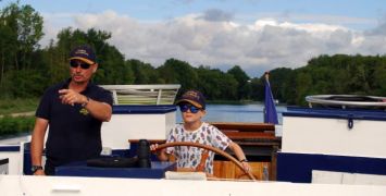 Cruises for Kids - Driving the barge