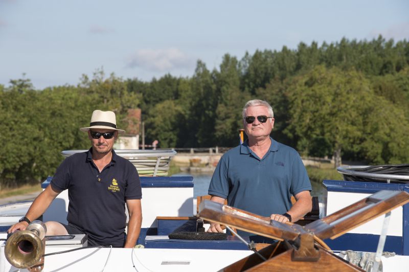 Solo Traveller at the helm of the Barge