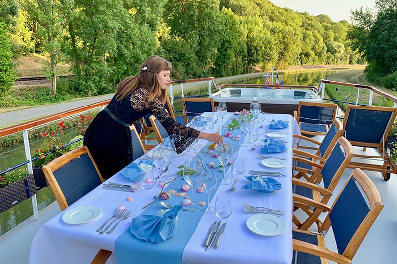 Dining table on the sundeck of La Belle Epoque