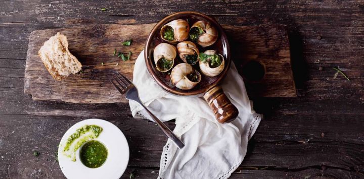 Escargots a la Bourgignon, or Burgundy snails in a garlic herb sauce is a local delicacy to Burgundy