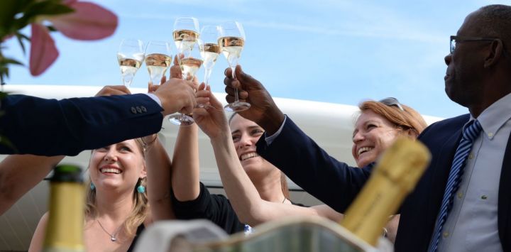 Luxury hotel barge guests celebrating aboard Finesse in Burgundy, France