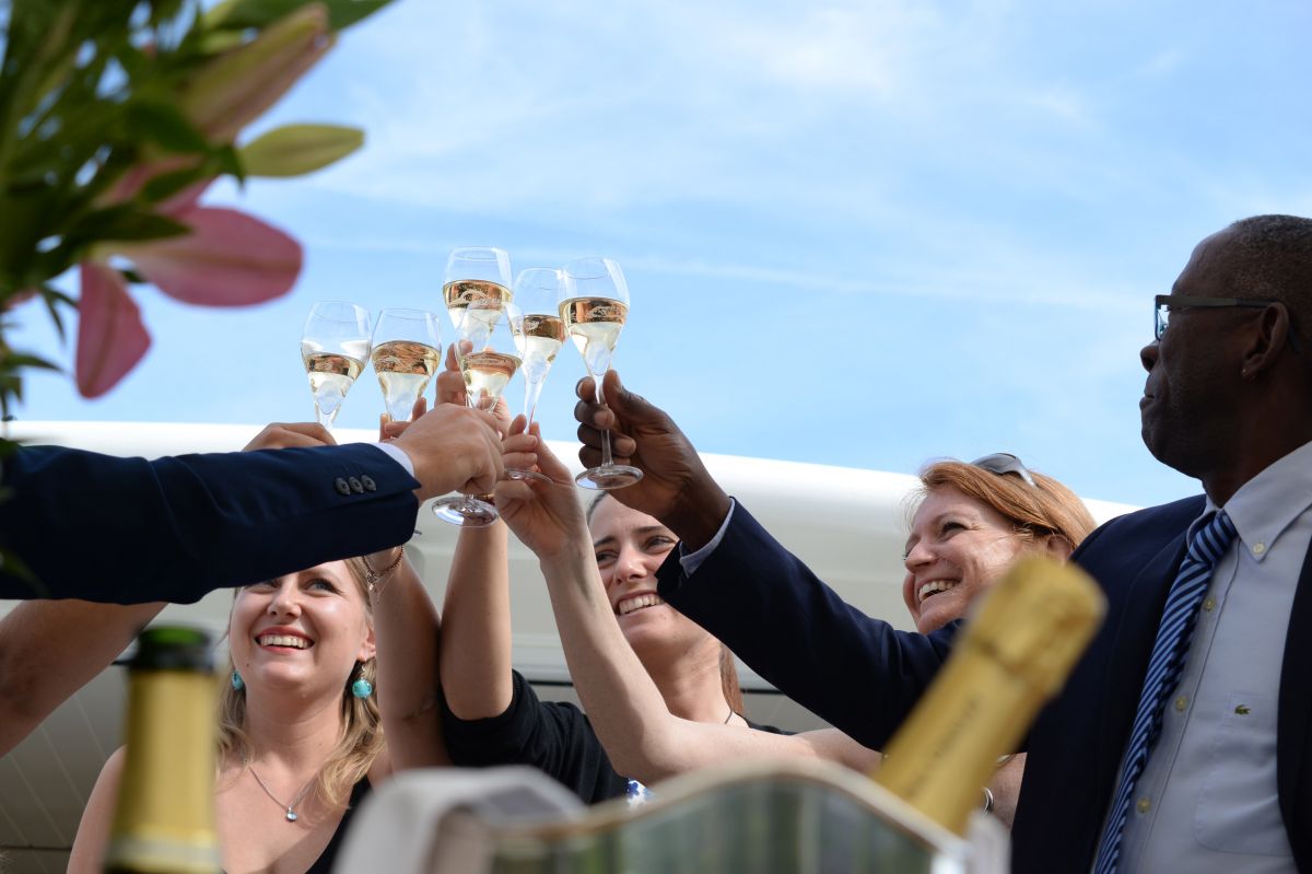 People celebrating aboard luxury barge cruise, Finesse in Burgundy France