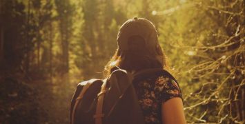 Solo traveller enjoying a walking excursion through local landscapes