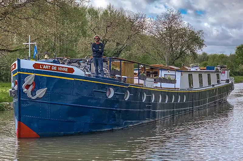 Captain Matthew Price aboard L'Art de Vivre on the Canal du Nivernais in Burgundy