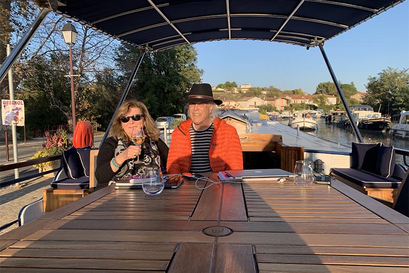 Judi and Lawrence aboard hotel barge Anjodi by Judi Cohen