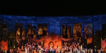 Cast of Carmen performing on stage at Arena di Verona