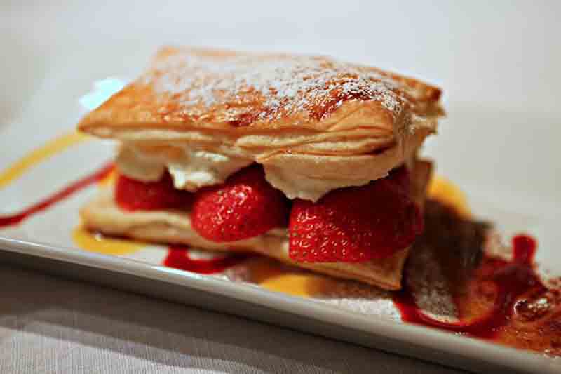 french pastry mille-feuille served aboard a luxury hotel barge