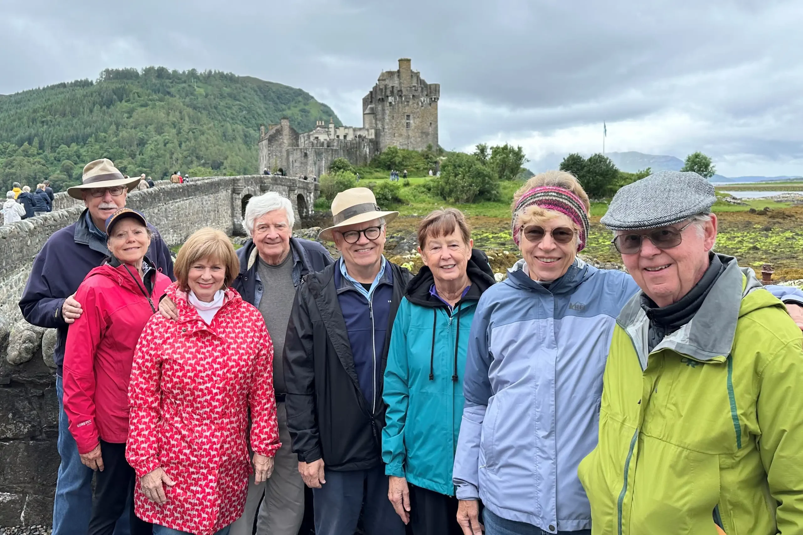 Client Ray Hoover and guests outside Eilean Donan Castle