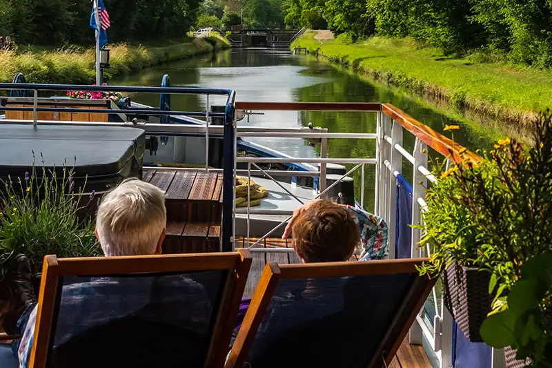 Guests enjoy the deck aboard Renaissance