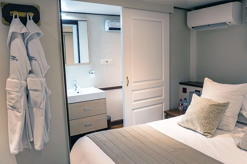 En suite cabin aboard hotel barge Panache