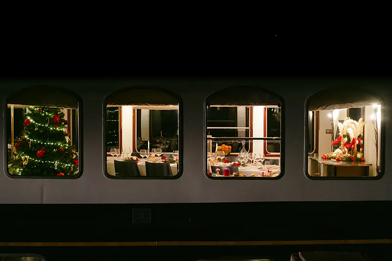 Barge with Christmas tree inside and table set