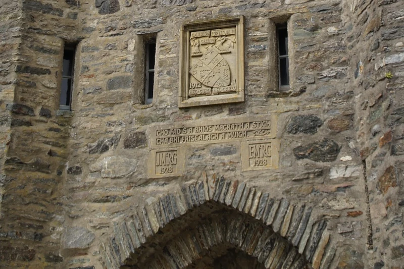 Eilean Donan castle restored to its former glory. The front gate is imposing.