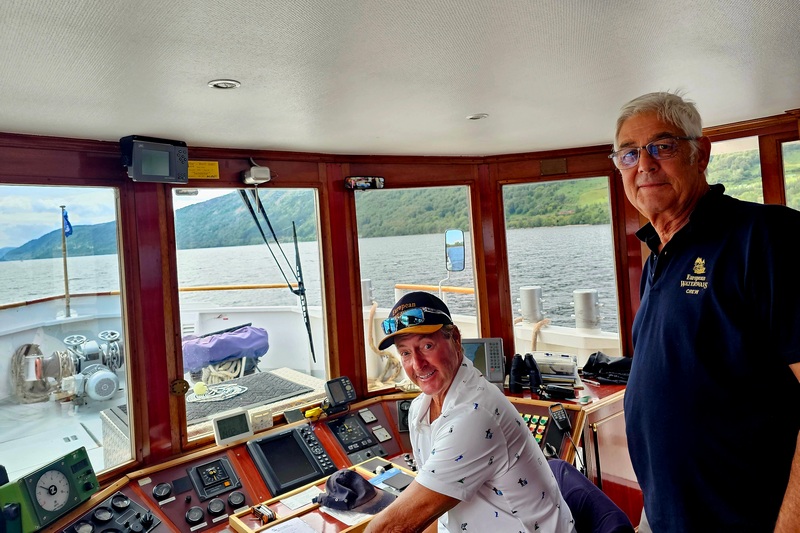 Danny and Krishna on the Spirit of Scotland Danny at the helm of the Spirit of Scotland hotel barge