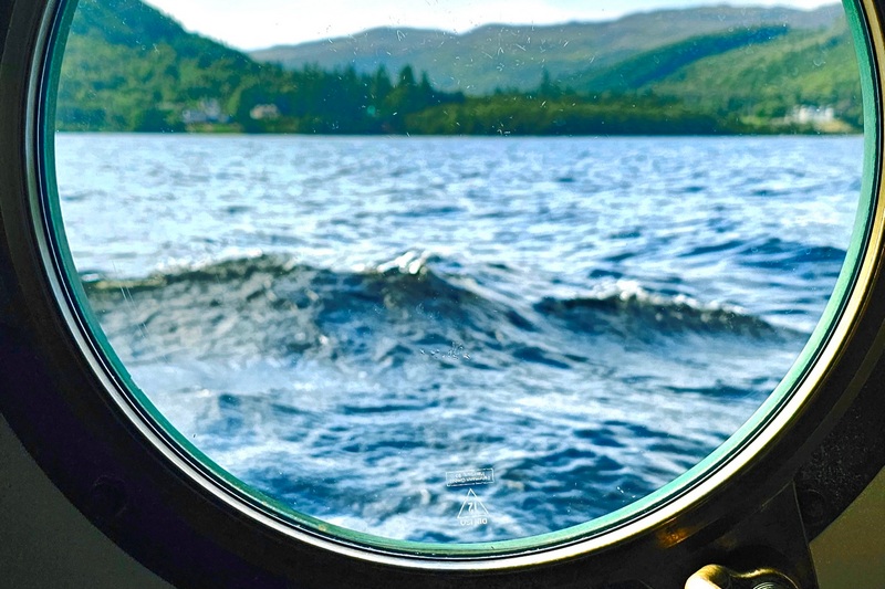 view of Scotland out of the porthole Spirit of Scotland A view of Scotland from the porthole onboard Spirit of Scotland
