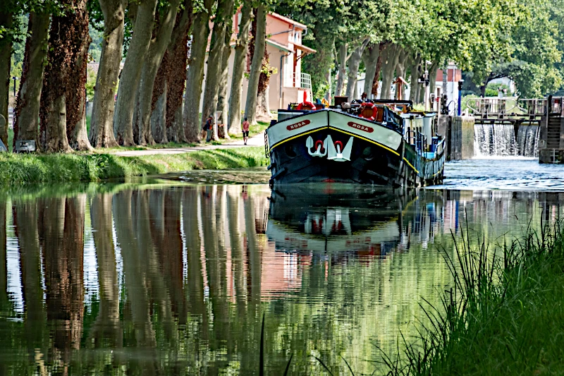 Onboard hotel barge Rosa in Gascony France by Rose Palmer featured cruising in dappled shade
